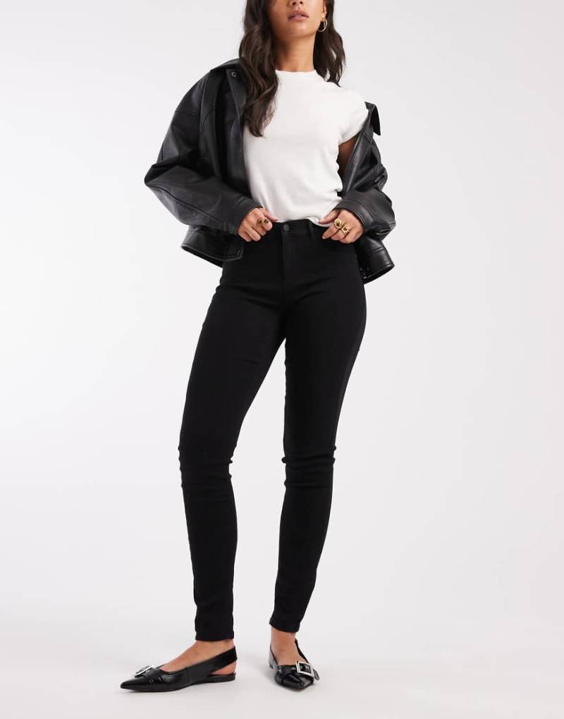 Only - Rain - Eng geschnittene Jeans mit mittelhohem Bund in Schwarz von ONLY