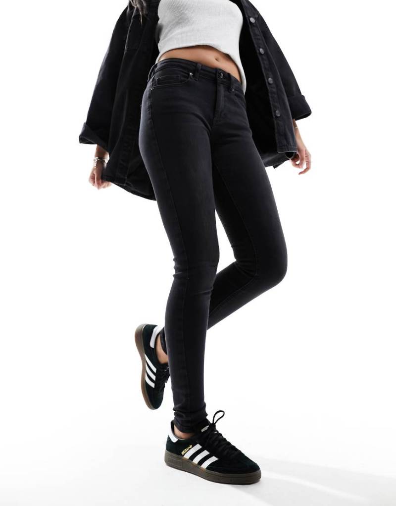 Only - Skinny-Jeans mit mittelhohem Bund in Schwarz von ONLY