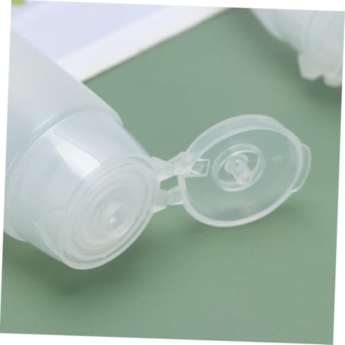 OUNONA 4 STÜCKE Nachfüllbare Kosmetik tuben aus PE und PP Leere Reisebehälter zum Befüllen Auslaufsichere Squeeze Flaschen für Shampoo Duschgel Gesichtsreiniger Handcreme von OUNONA