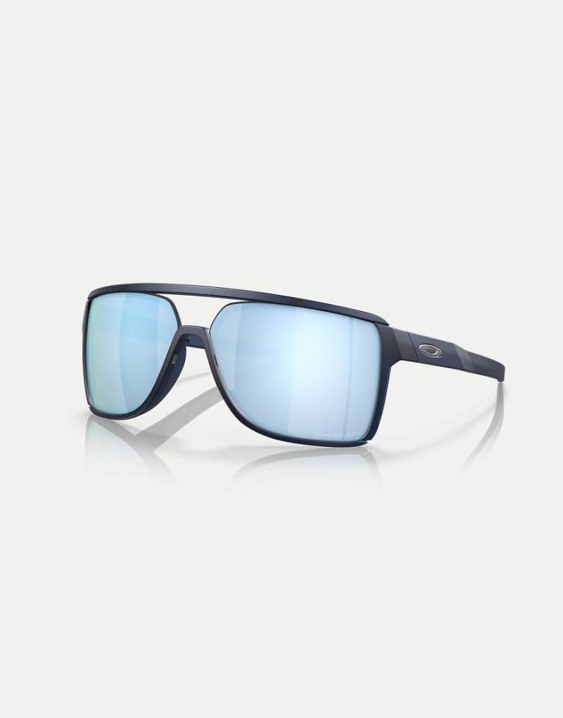 Oakley - Castel - Rechteckige, polarisierte Sonnenbrille in Blau mit verspiegelten Gläsern in matt schimmerndem Blau von Oakley