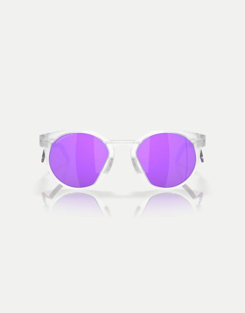 Oakley - Hstn - Runde, matt transparente Metall-Sonnenbrille mit lila verspiegelten Gläsern von Oakley