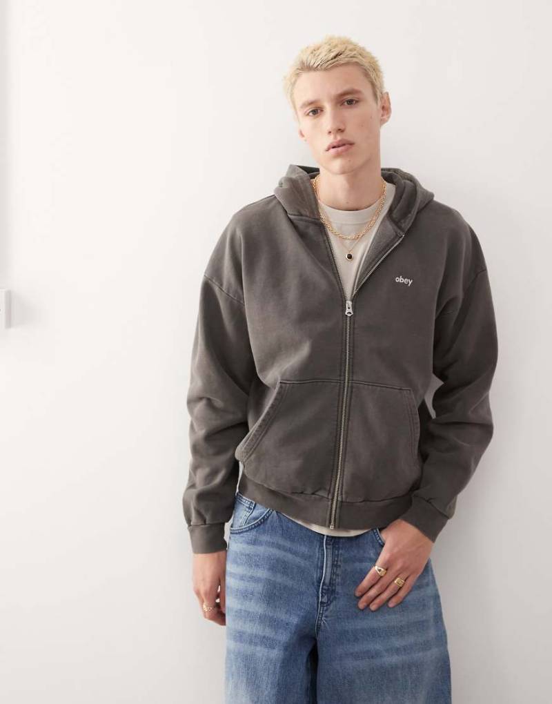 Obey - Kapuzenpullover in Pigment-Schwarz mit Reißverschluss und Logo von Obey