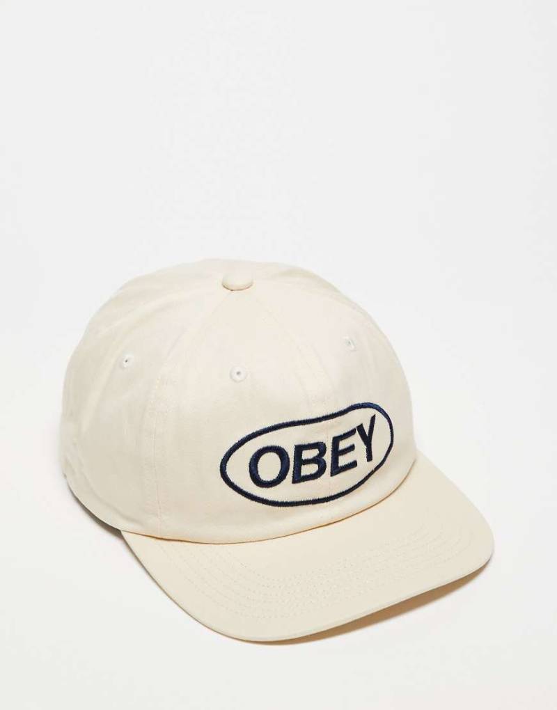 Obey - Strapback-Cap in Wollweiß mit 6-Bahnen-Design und ovalem „Obey"-Logo von Obey