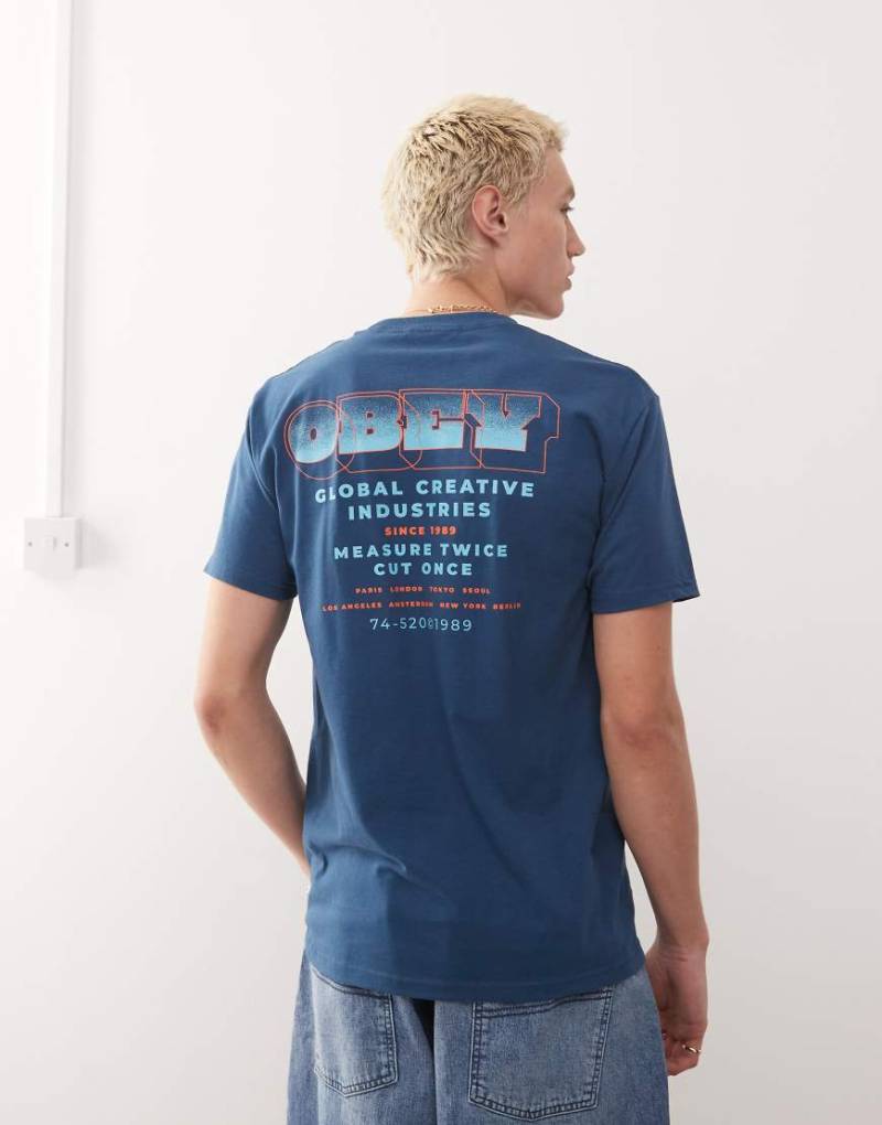 Obey - T-Shirt in Hafenblau mit „Measure Twice"-Rückenprint von Obey