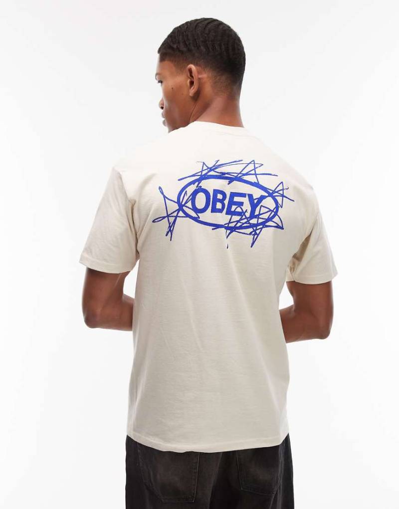 Obey - T-Shirt in Wollweiß mit Sternmotiven in Kritzeloptik von Obey