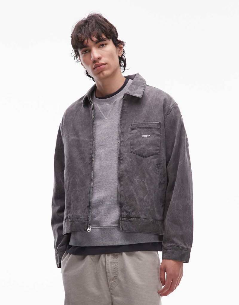 Obey - W- Truckerjacke in schwarzer Waschung mit Reißverschluss und Knitterstruktur von Obey