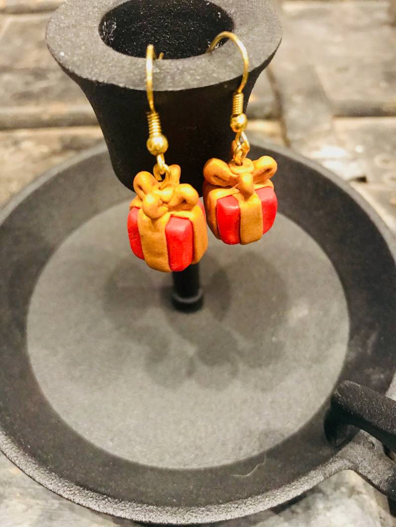 Präsentieren Ohrringe von OneInAJewel