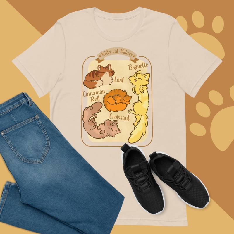 Kitty Katze Bäckerei T-Shirt Unisex von OrangeFouffArt