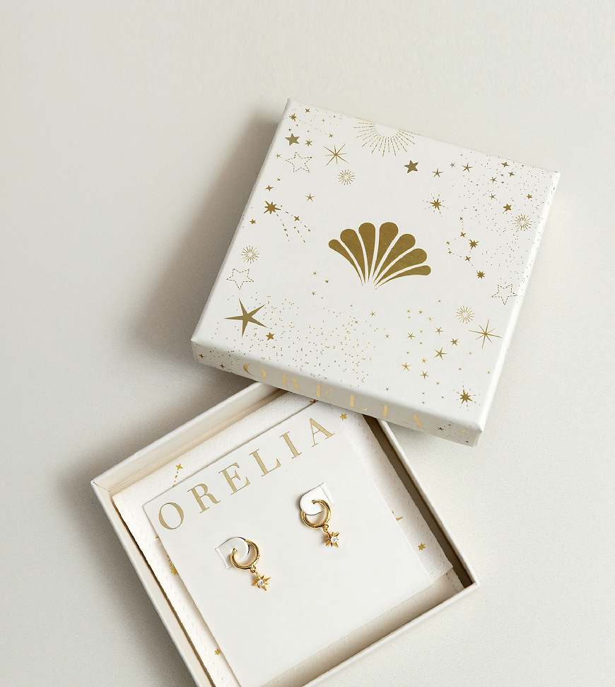Orelia - Vergoldete Creolen mit Mikro-Starburst-Anhänger mit Kristallbesatz und Geschenkbox-Goldfarben von Orelia