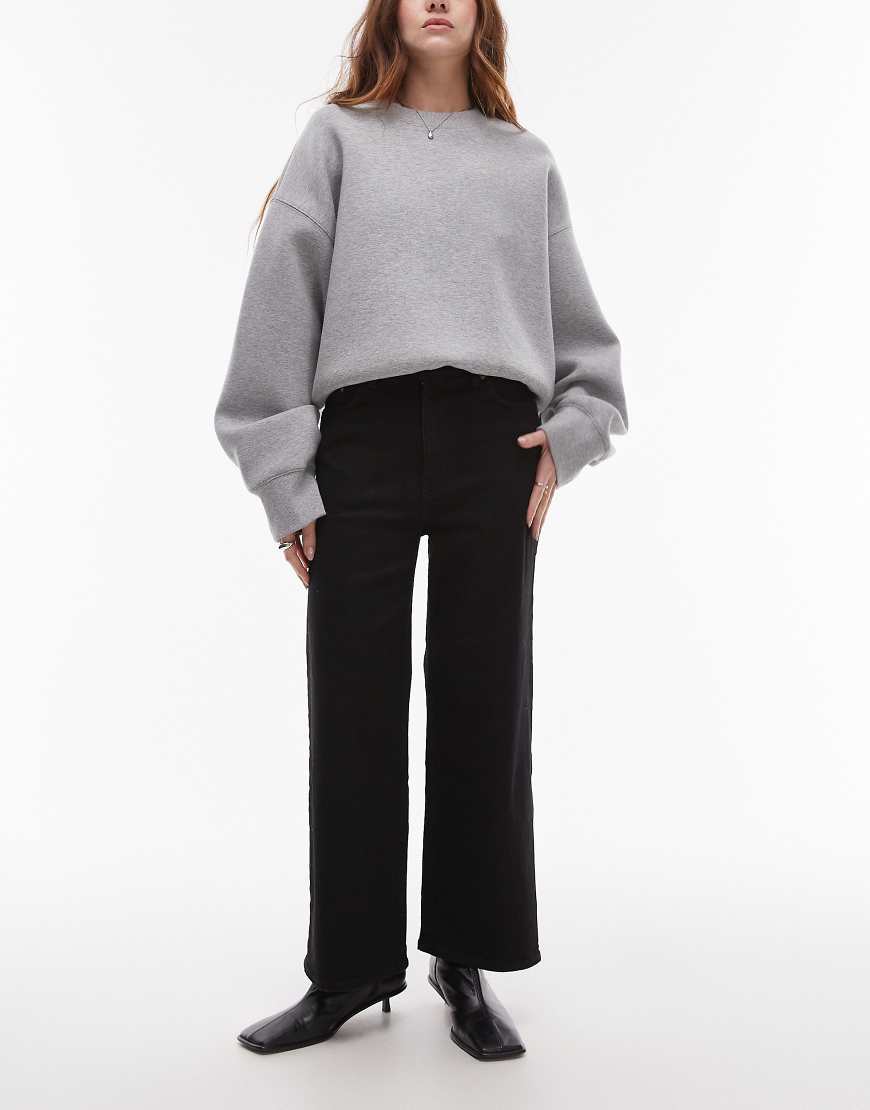 & Other Stories - Elastische, kurz geschnittene Jeans mit Rinse-Waschung in Schwarz und weitem Bein & Other Stories - Elastische, kurz geschnittene Jeans mit Rinse-Waschung in Schwarz und weitem Bein von Other Stories