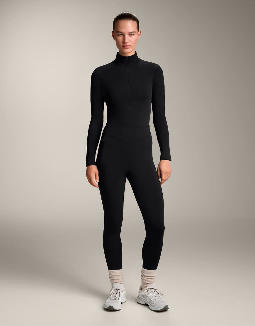 OYSHO - Baselayer-Body in Schwarz mit kurzem Reißverschluss OYSHO - Baselayer-Body in Schwarz mit kurzem Reißverschluss von Oysho