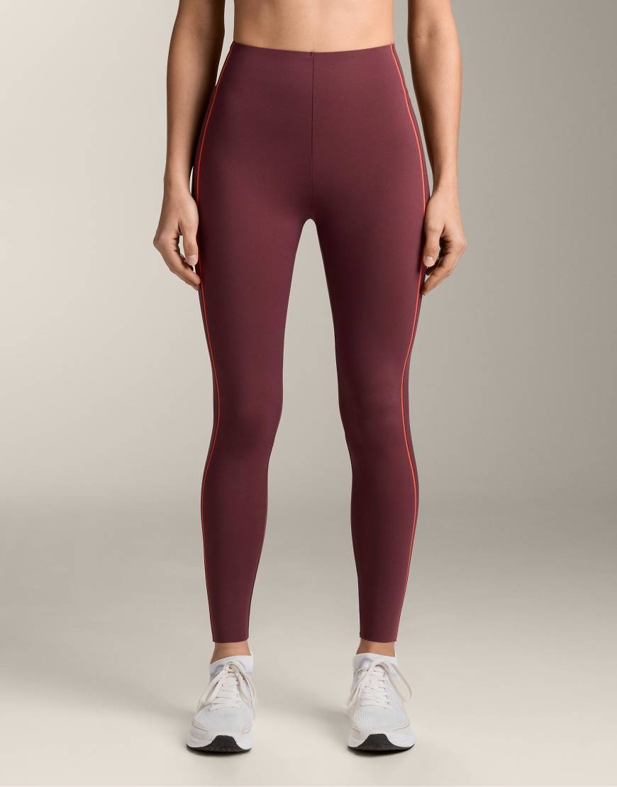 OYSHO - Compressive Core Control - Knöchellange Leggings in Kastanienbraun mit hohem Bund, 65 cm Schrittlänge-Rot von Oysho
