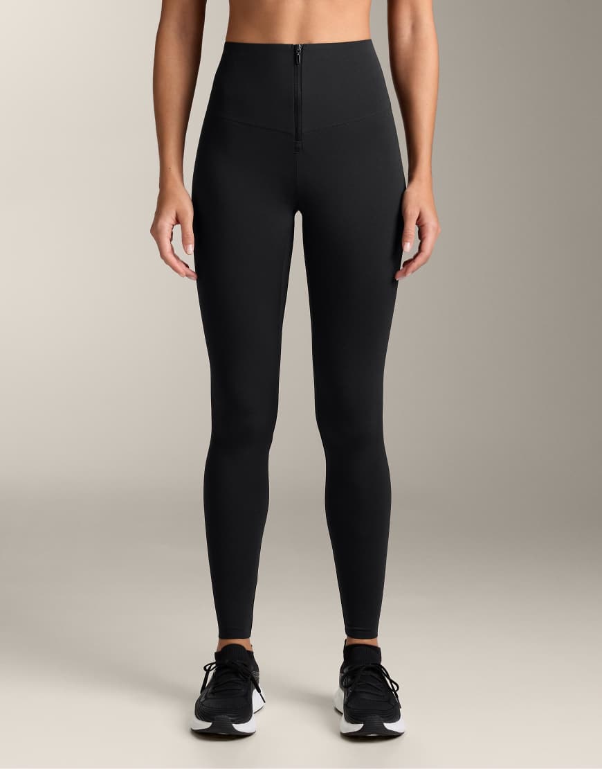 OYSHO - Compressive Core Control - Knöchellange Leggings in Schwarz mit Reißverschluss von Oysho