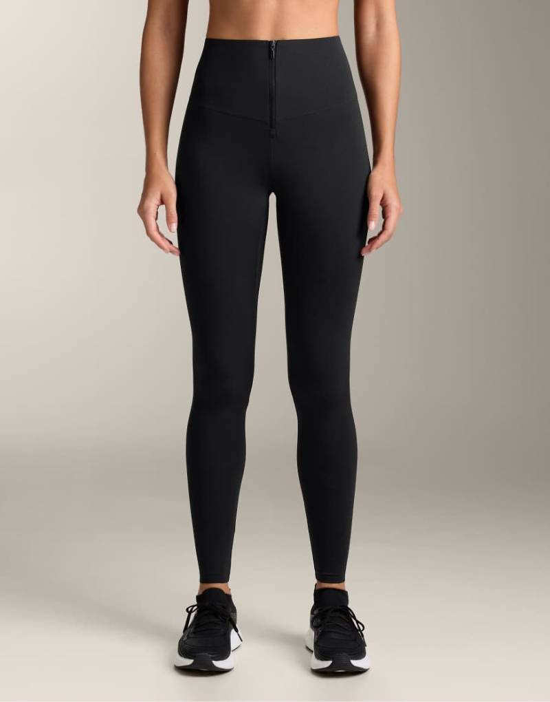 OYSHO - Compressive Core Control - Knöchellange Leggings in Schwarz mit Reißverschluss von Oysho