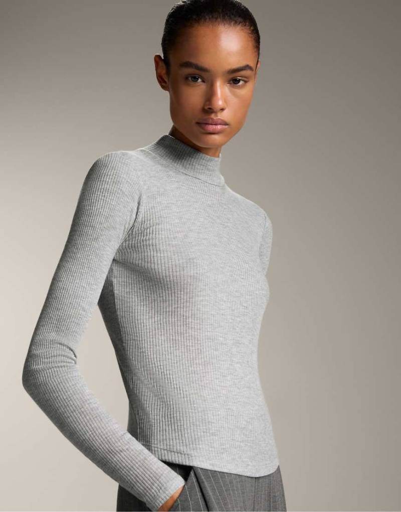 OYSHO - Hochgeschlossenes, geripptes T-Shirt mit Lyocell in Schwarz von Oysho