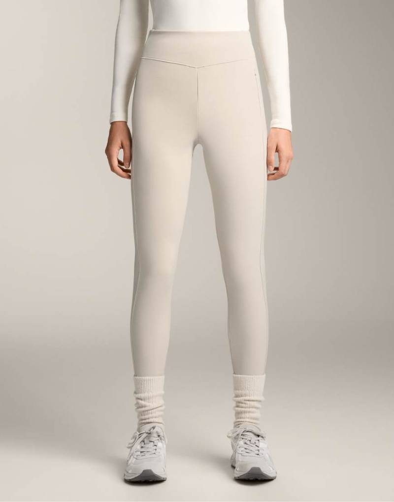 OYSHO - Knöchellange, warme Leggings in Hellrosa mit Taschen und hohem Bund, 70 cm Schrittlänge von Oysho