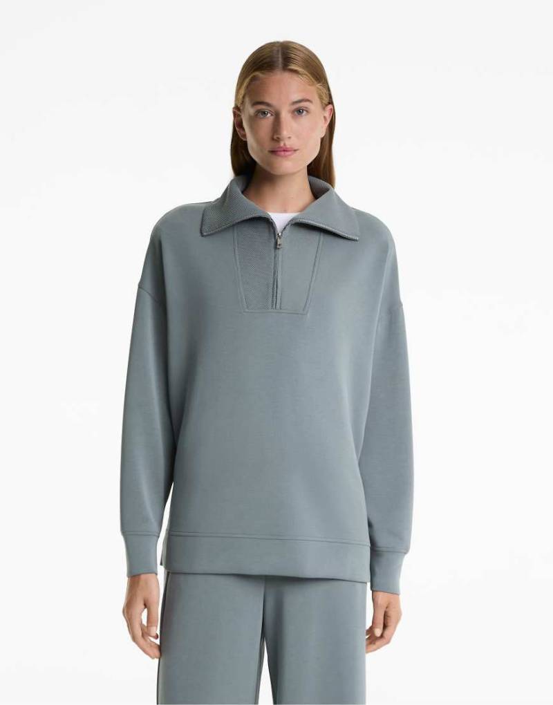 OYSHO - Lange Jacke in Stahlblau mit hohem Kragen und weichem Modal von Oysho