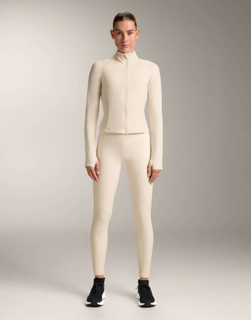 OYSHO - Leichte, warme Jacke aus Funktionsmaterial in Elfenbein-Ecru mit Waffelstruktur-Neutral von Oysho