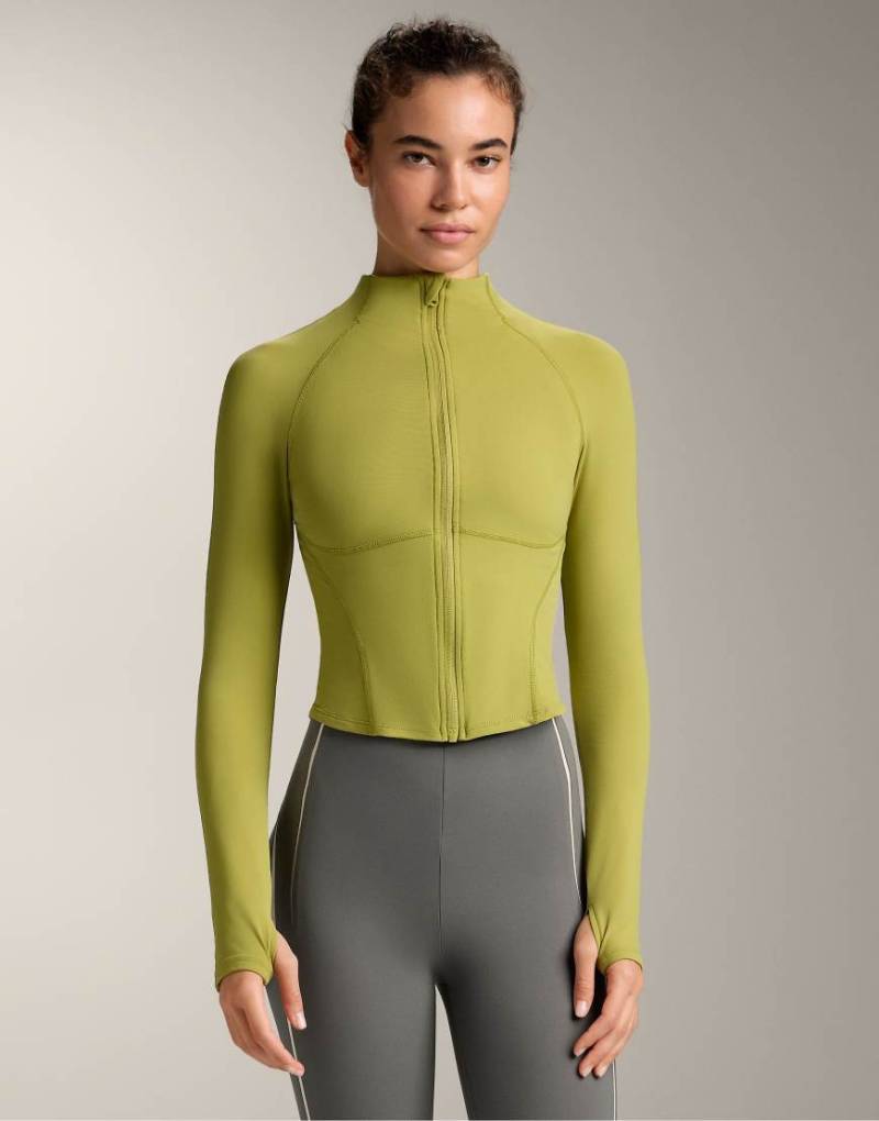 OYSHO - Leichte, warme Jacke in Hellgrün mit Ziernähten von Oysho