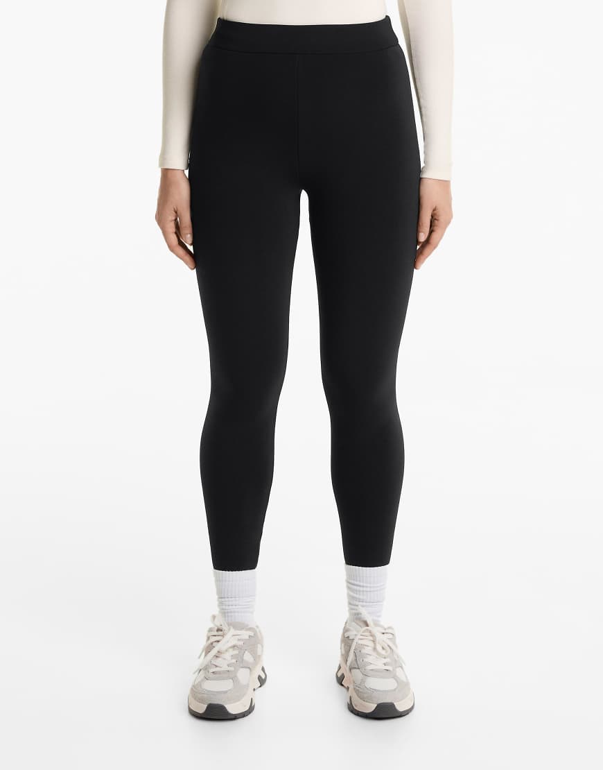 OYSHO - Nahtlose, ultrawarme, knöchellange Leggings in Schwarz mit hohem Bund, 70 cm Schrittlänge von Oysho