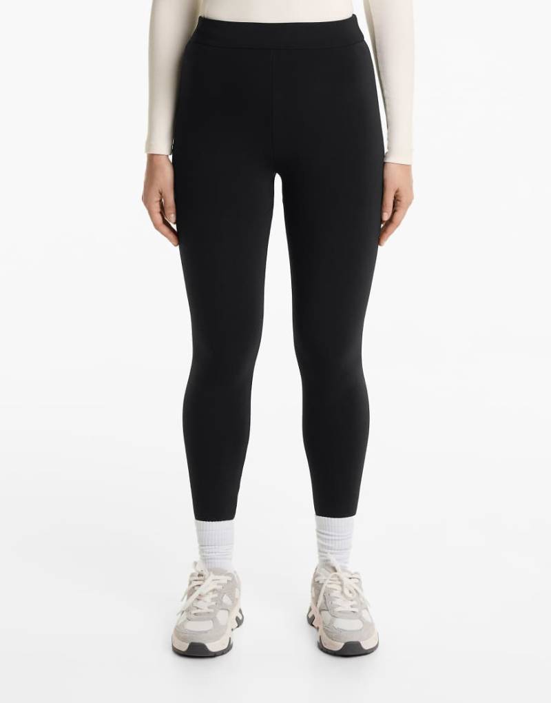 OYSHO - Nahtlose, ultrawarme, knöchellange Leggings in Schwarz mit hohem Bund, 70 cm Schrittlänge von Oysho
