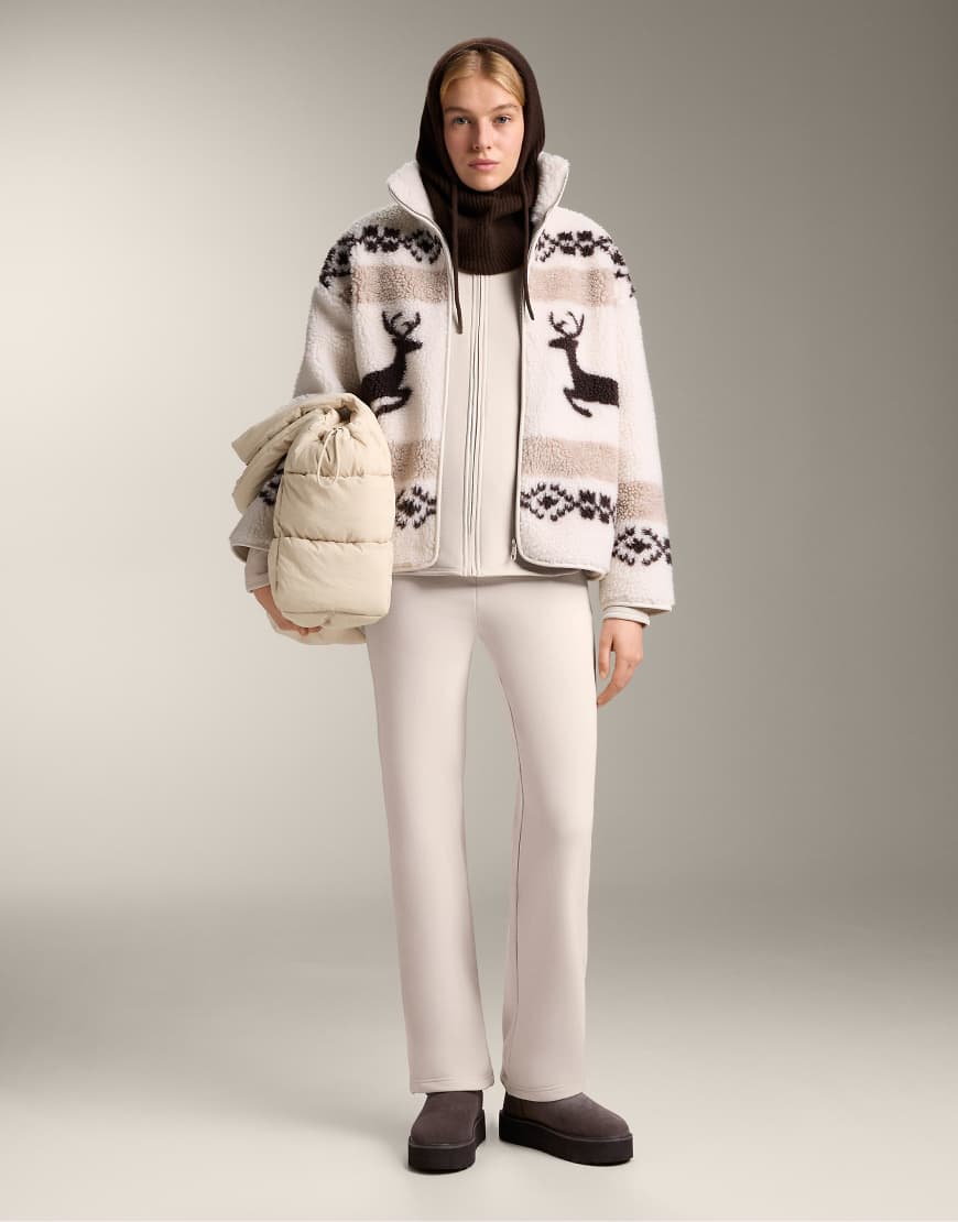 OYSHO - Nahtlose, ultrawarme Bootcut-Hose in Hellrosa mit hohem Bund von Oysho