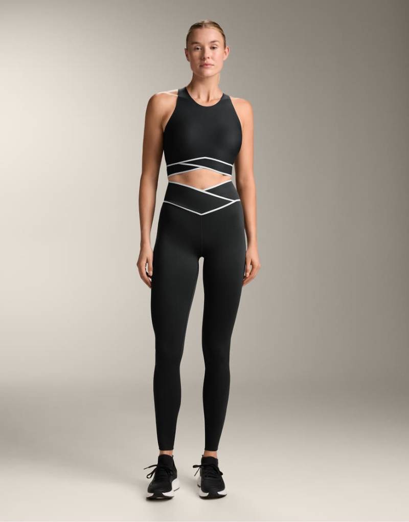 OYSHO - Perfect-Adapt - Knöchellange Leggings in Schwarz mit überkreuztem, v-förmigem Bund, 65 cm von Oysho