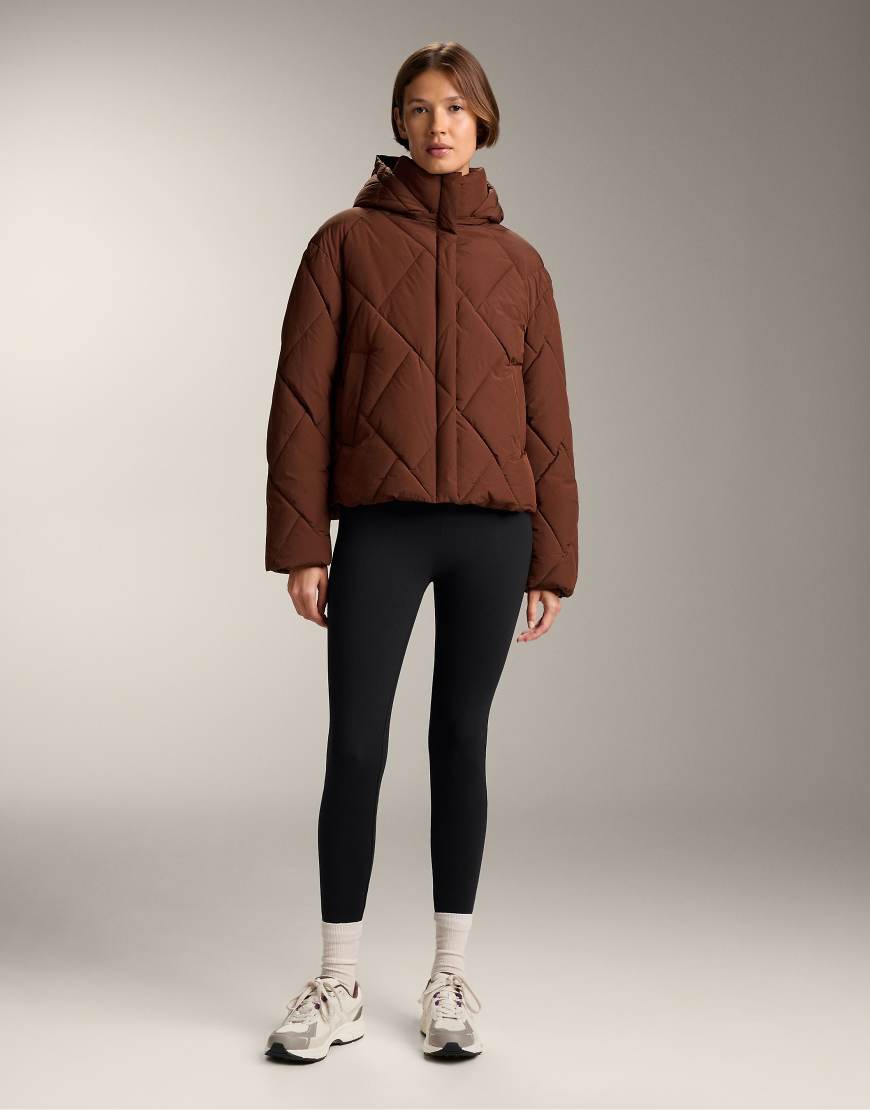 OYSHO - Wasserabweisende, wattierte Jacke aus Primaloft in Braun-Rosa OYSHO - Wasserabweisende, wattierte Jacke aus Primaloft in Braun-Rosa von Oysho