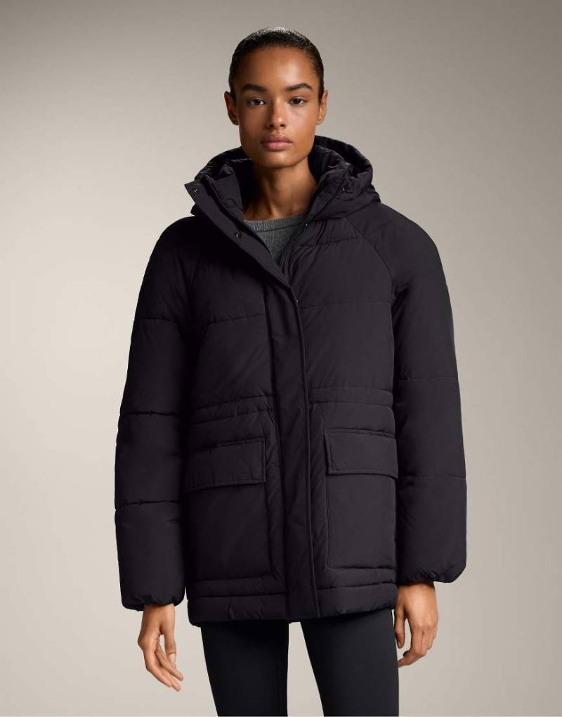OYSHO - Wasserabweisende, wattierte Jacke aus Primaloft in Schwarz OYSHO - Wasserabweisende, wattierte Jacke aus Primaloft in Schwarz von Oysho