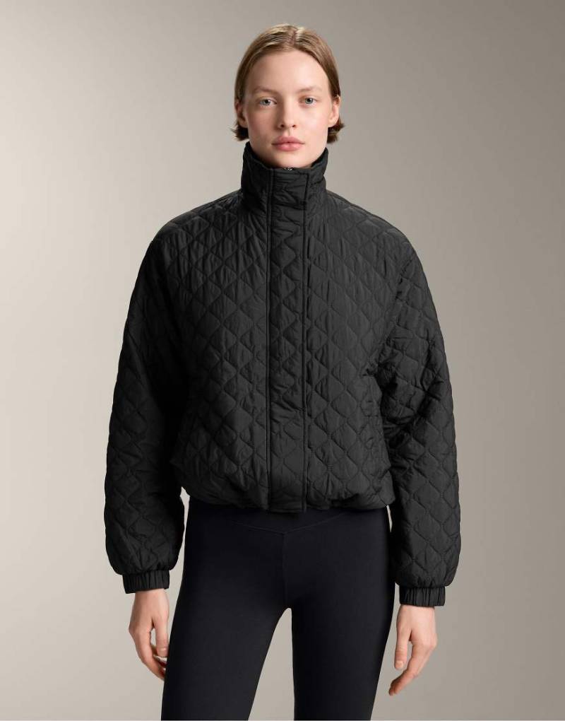 OYSHO - Wattierte Kurzjacke in Schwarz mit Fellex Aerogel von Oysho