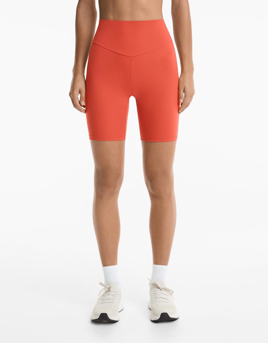 Oysho - Comfortlux - Leggings in Orange mit hohem Bund, 20 cm Schrittlänge Oysho - Comfortlux - Leggings in Orange mit hohem Bund, 20 cm Schrittlänge von Oysho