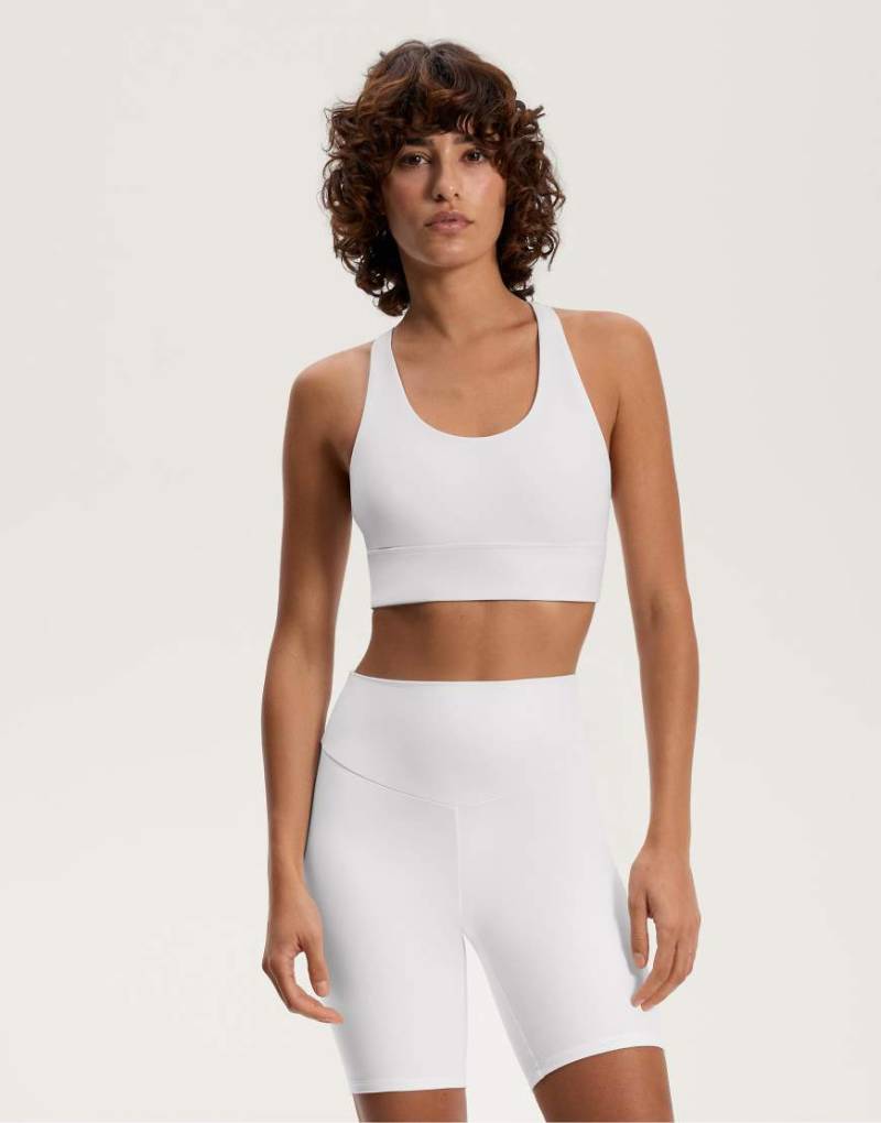 Oysho - Comfortlux - Sport-BH in Wollweiß mit Körbchen und mittlerer Stützfunktion von Oysho