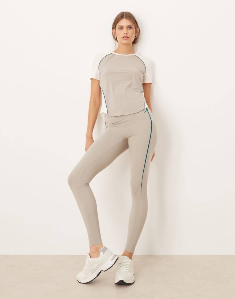 Oysho - Compressive Core Control Lines - Knöchellange Leggings in Nerzbeige mit hohem Bund, 65 cm-Brown von Oysho