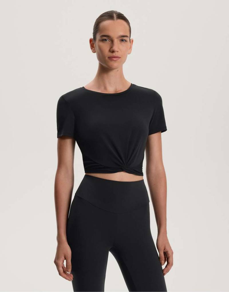 Oysho - Kurzärmliges T-Shirt aus Modal-Mix in Schwarz mit Knotendesign von OYSHO