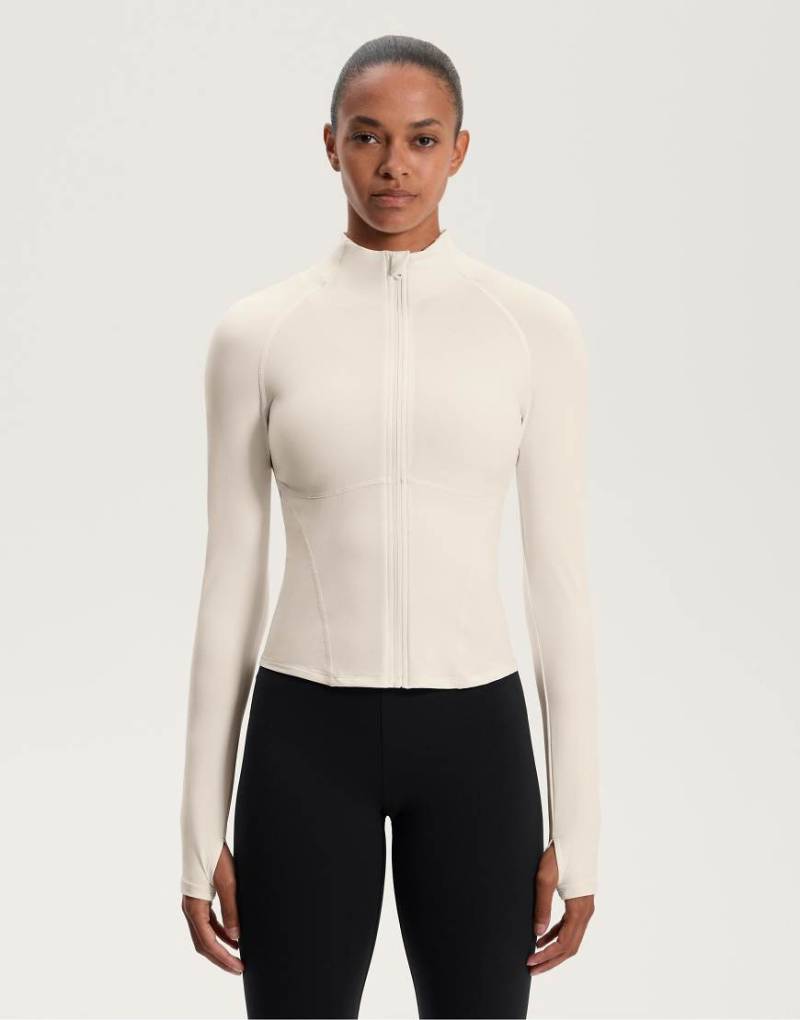 Oysho - Leichte, warme Jacke in blassem Ecru mit Ziernaht-Neutral von Oysho