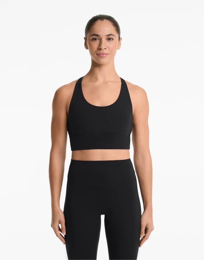 Oysho - Sport-BH aus Comfortlux in Schwarz mit integrierten Cups und mittlerer Stützfunktion Oysho - Sport-BH aus Comfortlux in Schwarz mit integrierten Cups und mittlerer Stützfunktion von Oysho