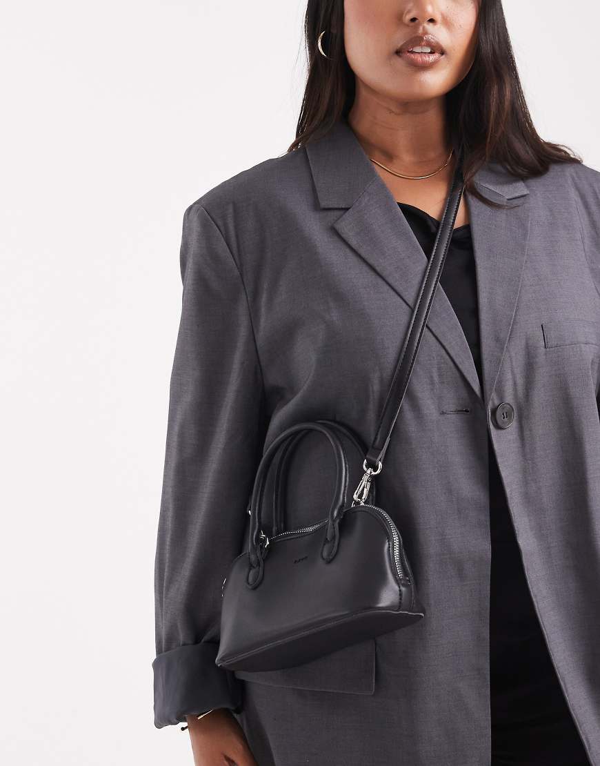 PASQ - Handtasche in Schwarz mit zwei Trageriemen PASQ - Handtasche in Schwarz mit zwei Trageriemen von PASQ