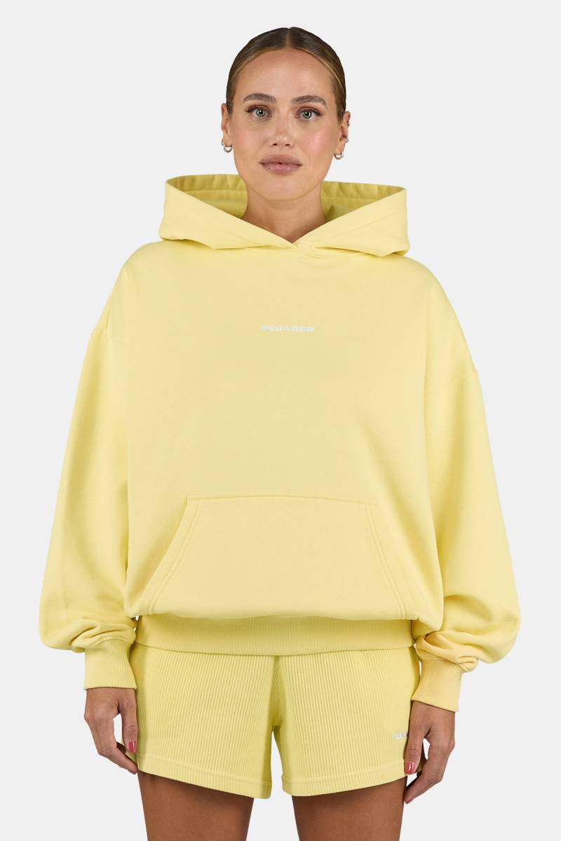 Clarita Logo Oversized Hoodie Washed Soft Yellow White von PEGADOR®