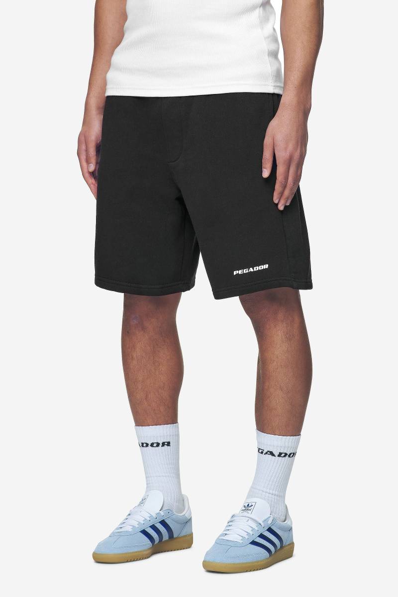 Logo Heavy Sweat Shorts Washed Black White Gum von PEGADOR®