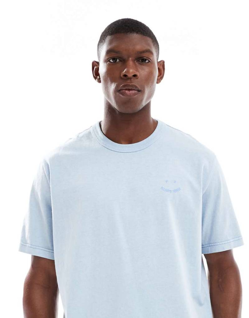 PS Paul Smith - Oversize-T-Shirt in Hellblau mit Smiley-Logo von PS Paul Smith