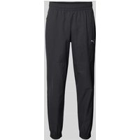 PUMA PERFORMANCE Jogpants mit elastischem Bund Modell 'TECH' in Black, Größe XXL von PUMA PERFORMANCE