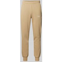 PUMA PERFORMANCE Regular Fit Sweatpants mit Label-Print in Beige, Größe L von PUMA PERFORMANCE