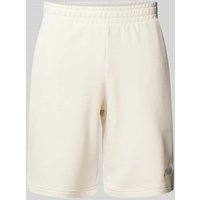 PUMA PERFORMANCE Regular Fit Sweatshorts mit Label-Stitching in Offwhite, Größe L von PUMA PERFORMANCE
