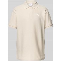 PUMA PERFORMANCE Relaxed Fit Poloshirt mit Label-Stitching in Offwhite, Größe XXL von PUMA PERFORMANCE