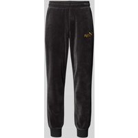 PUMA PERFORMANCE Relaxed Fit Sweatpants mit Label-Stitching Modell 'Velvettrack' in Black, Größe M von PUMA PERFORMANCE