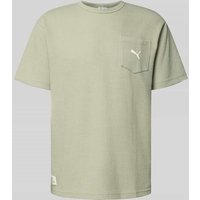 PUMA PERFORMANCE Relaxed Fit T-Shirt mit Brusttasche in Hellgruen, Größe M von PUMA PERFORMANCE