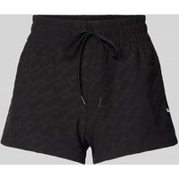PUMA PERFORMANCE Shorts mit Logo-Muster in Black, Größe L von PUMA PERFORMANCE