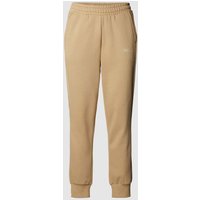 PUMA PERFORMANCE Sweatpants mit Label-Print in Beige, Größe L von PUMA PERFORMANCE