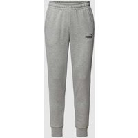 PUMA PERFORMANCE Sweatpants mit Label-Print in Mittelgrau, Größe L von PUMA PERFORMANCE