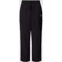 PUMA PERFORMANCE Sweatpants mit Label-Stitching in Black, Größe XL von PUMA PERFORMANCE
